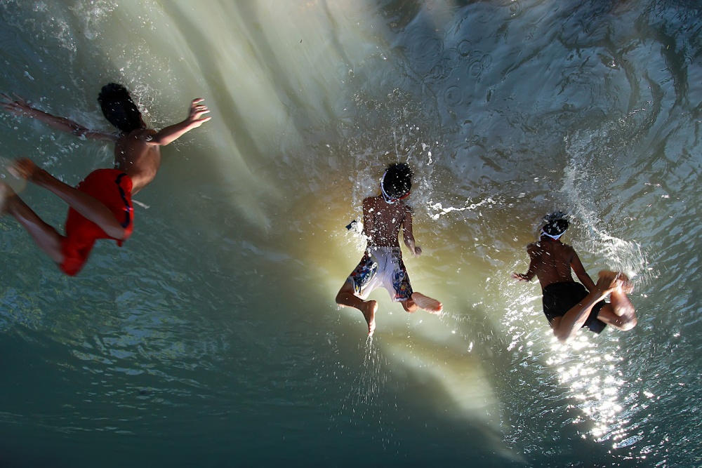 Splashing Summer Fun by Adhi Prayoga — canvas wall art
