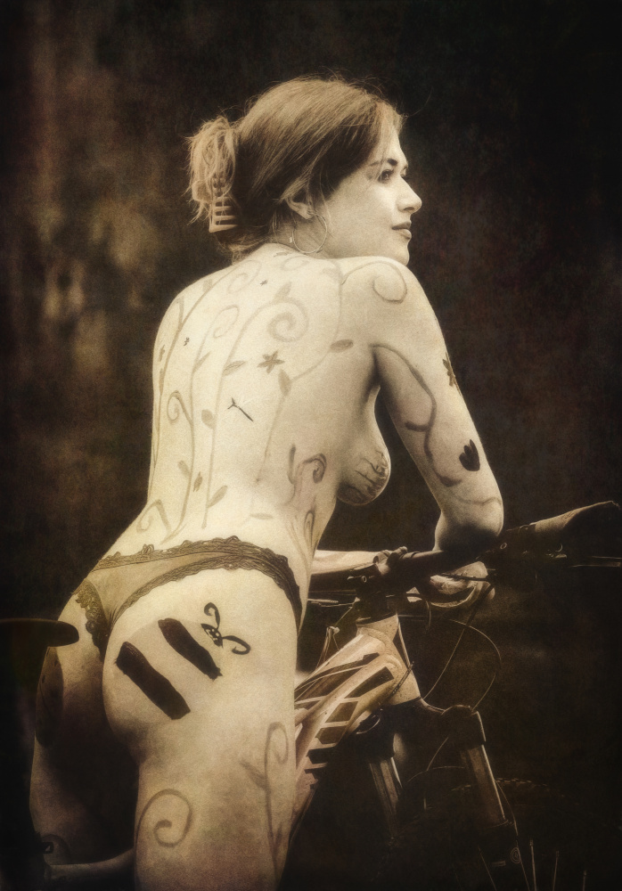 Painted Woman on Bike by Mia Meng — canvas wall art