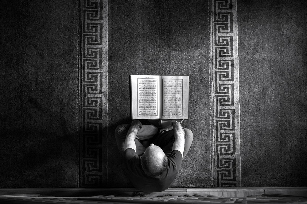 Man Reading Sacred Text by Yavuz Pancareken — canvas wall art