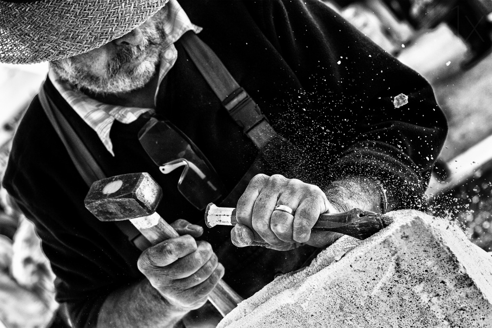 Artisan Shaping Stone by Manu Allicot — canvas wall art