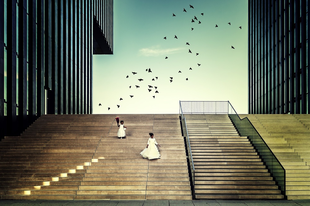 Girls on Modern Stairs by Dennis Mohrmann — canvas wall art
