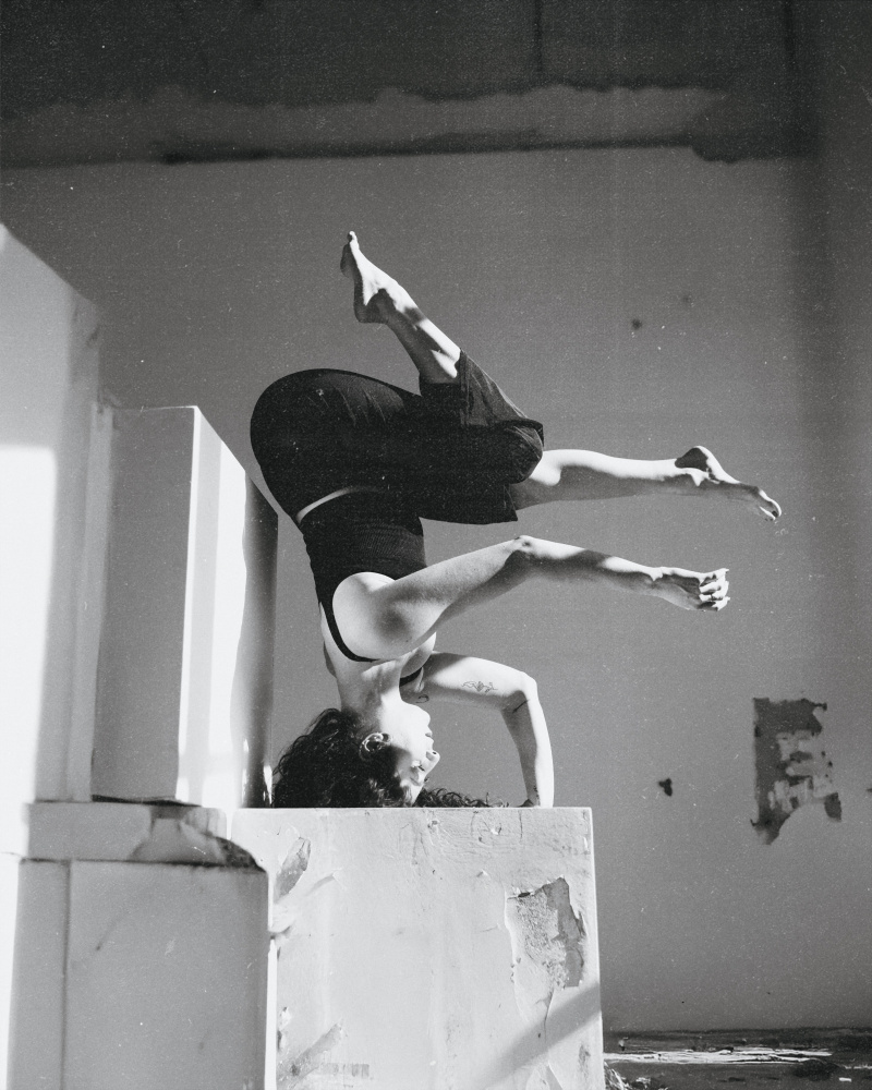 Dancer's Headstand Balance by Tyler McAuley — canvas wall art