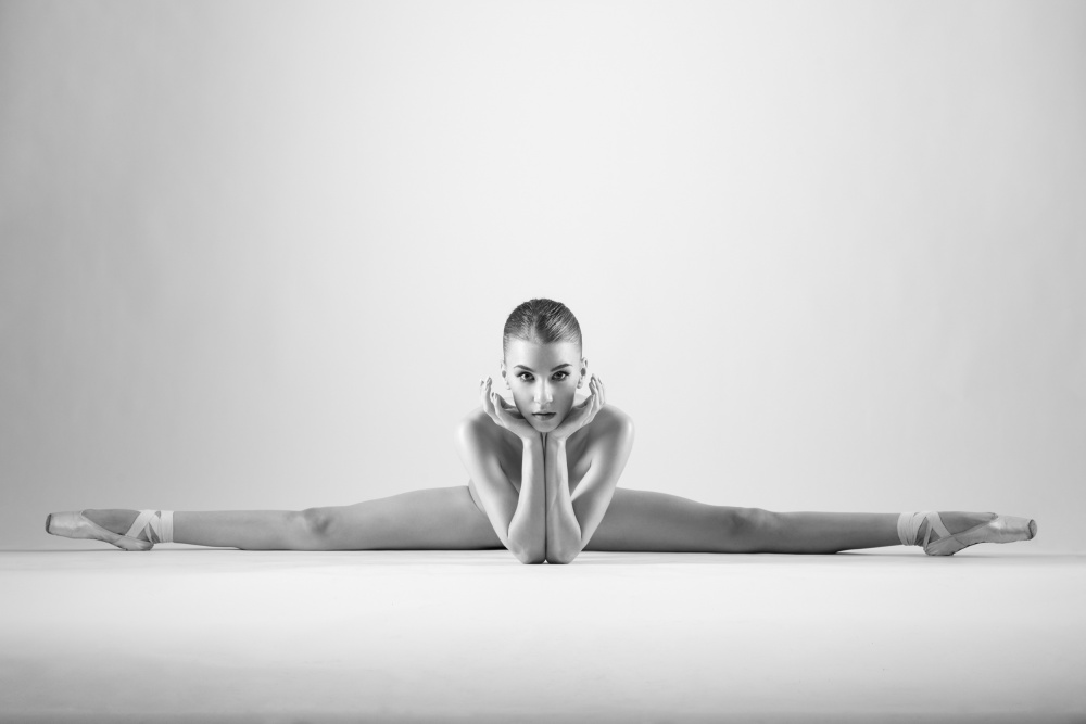 Ballerina's Elegant Split by Arkadiusz Branicki — canvas wall art