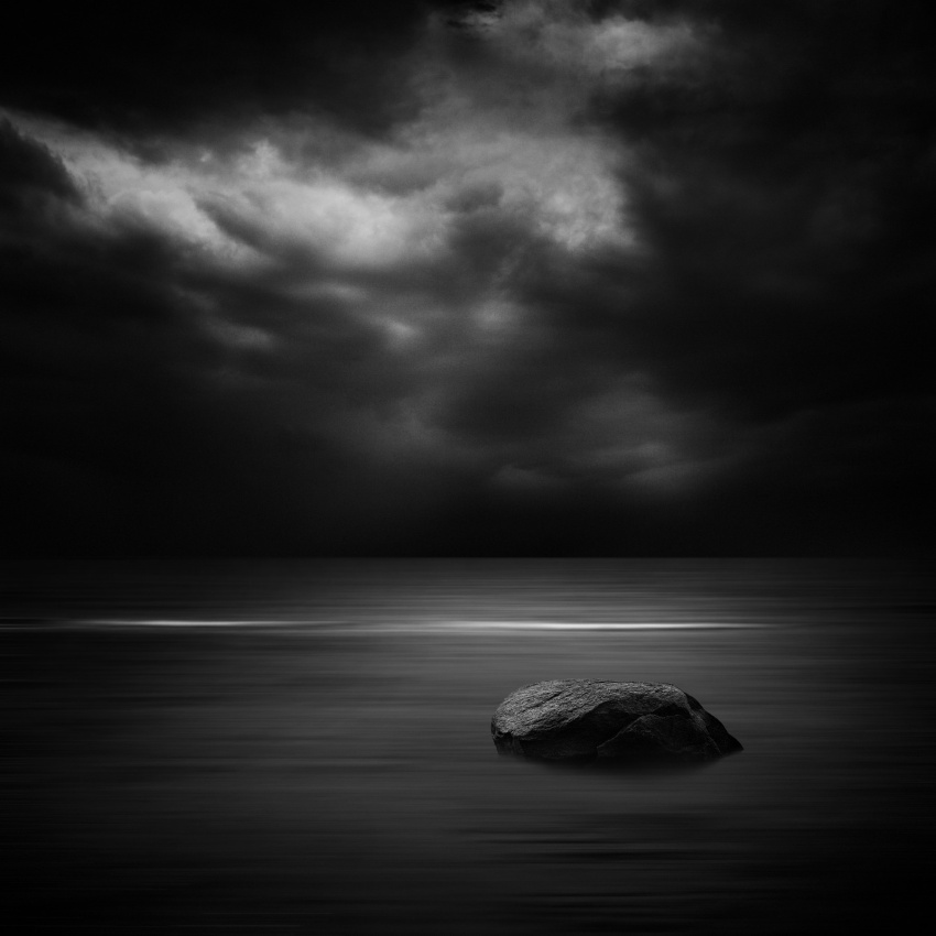 **Dark Seascape Solitary Rock** by Kaspars Kurcens — canvas wall art