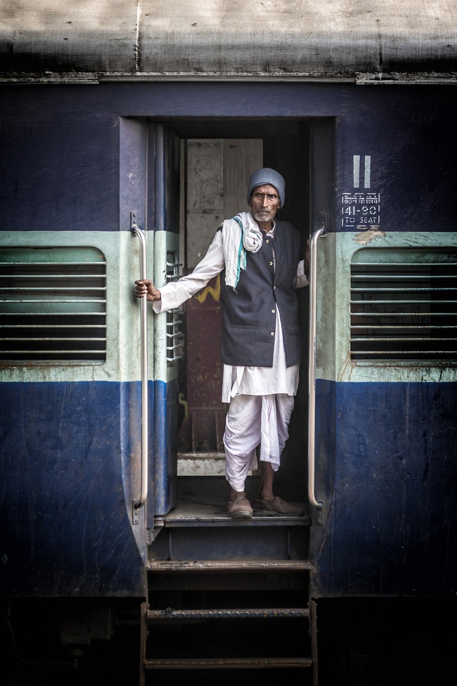 Indian Man Train Journey by Pavol Stranak — canvas wall art