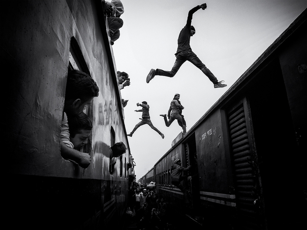 People Jumping Trains by Marcel Rebro — canvas wall art