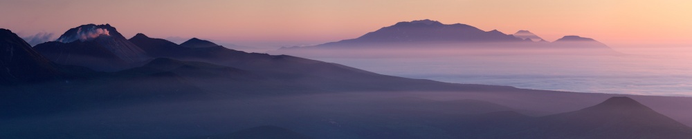 Misty Coastal Peaks by Alexey Kharitonov — canvas wall art