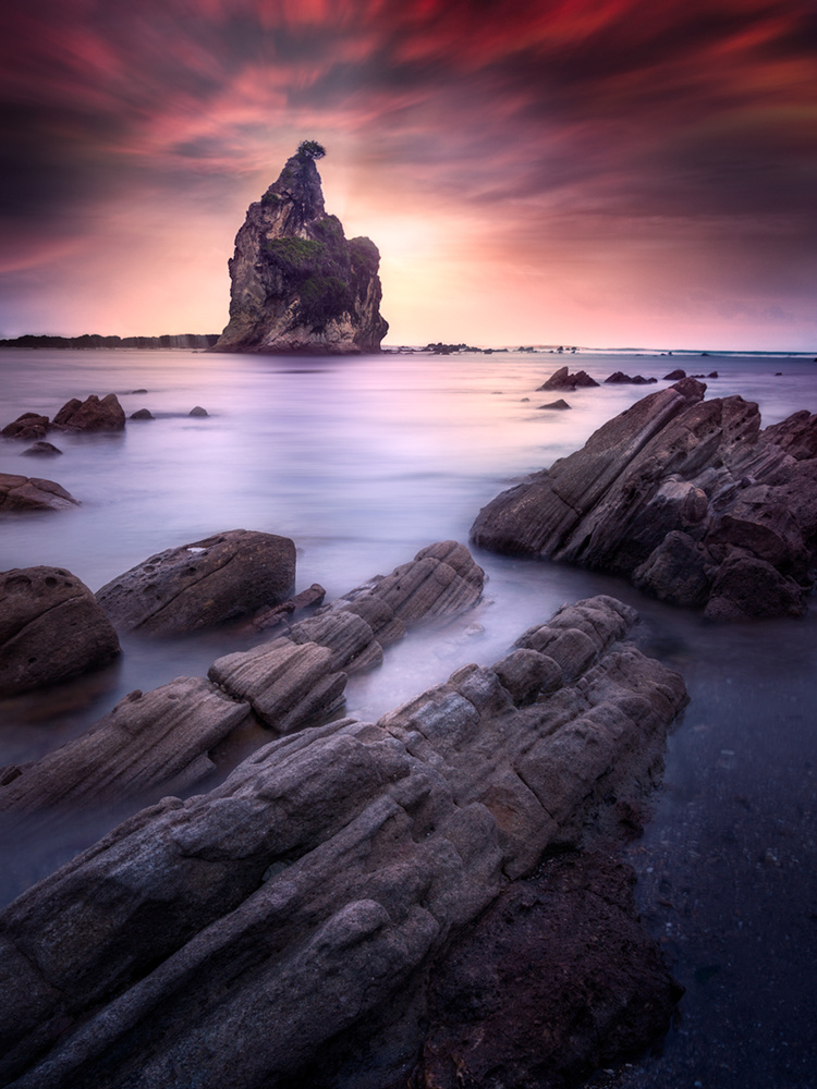Dramatic Sea Stack Sunset by Rudi Gunawan — canvas wall art
