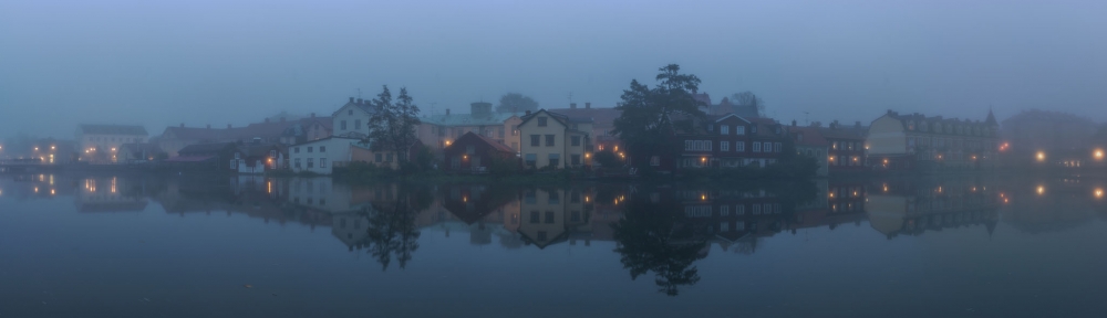 Misty Blue Hour Town by Arne Östlund — canvas wall art