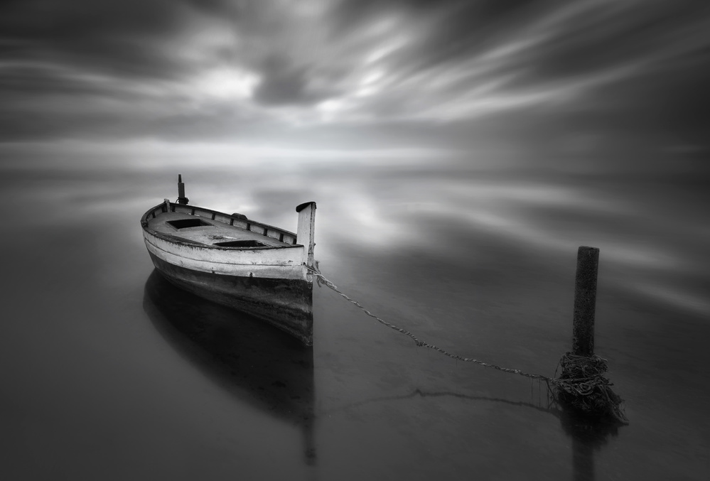Lonely Boat on Calm Water by Joaquin Guerola — canvas wall art