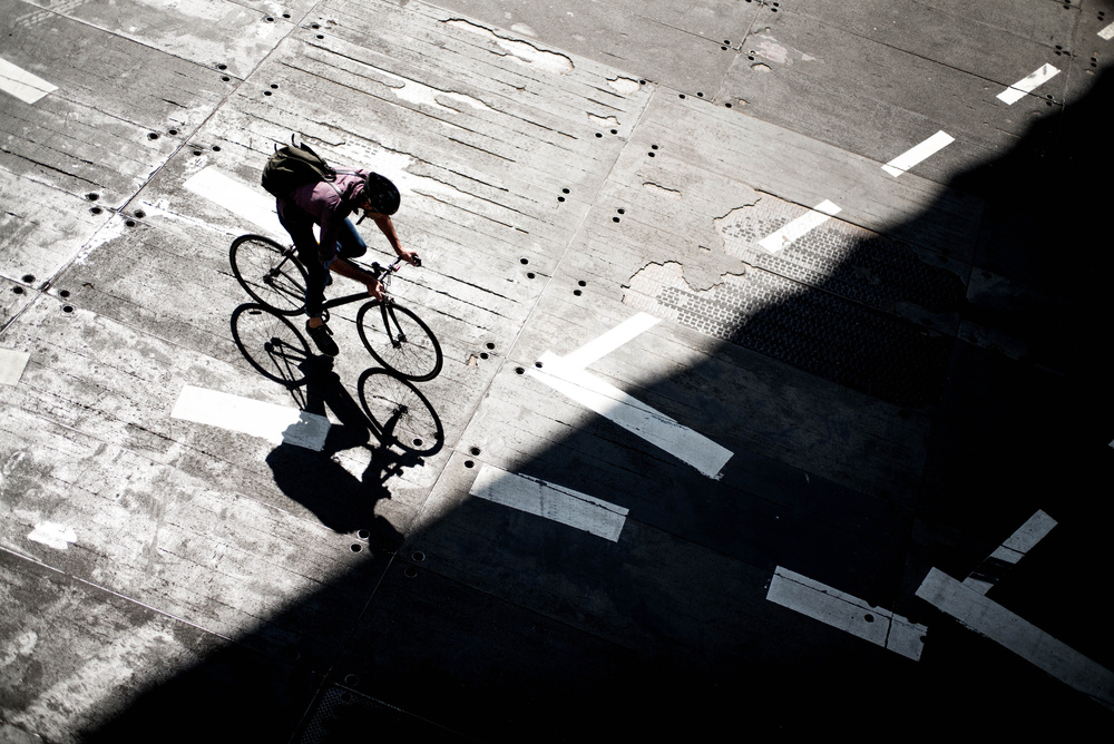 Overhead Cyclist Shadow by Satoshi Iwata — canvas wall art