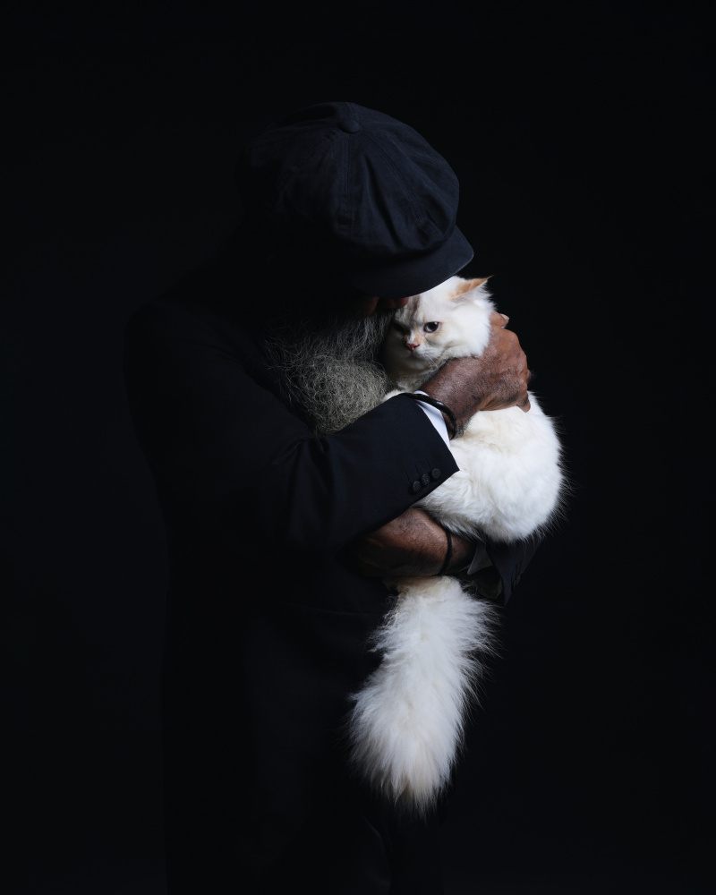 Bearded Man Holding Cat by Asep Awaludin — canvas wall art
