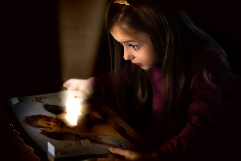Curious Girl with Book by Carsten Velten — canvas wall art