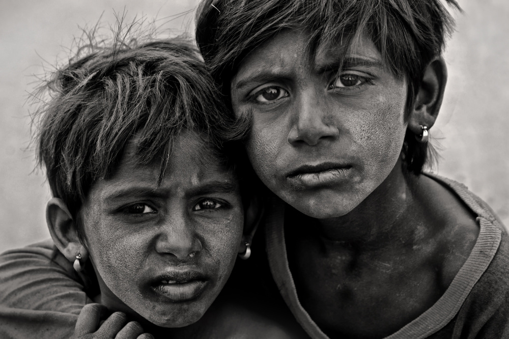 Somber Young Gaze by Lou Urlings — canvas wall art