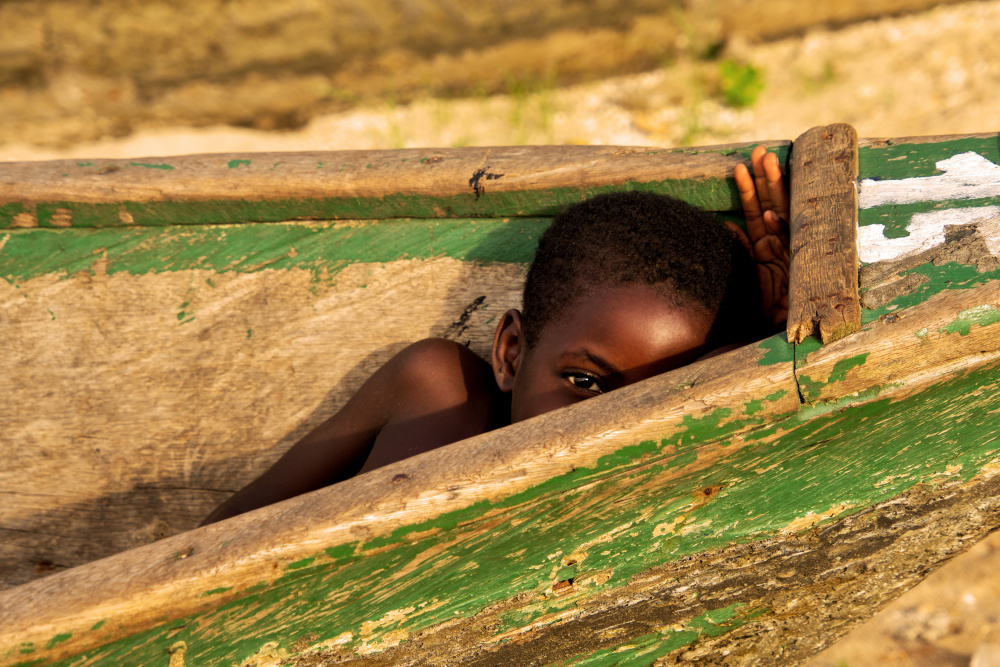 Curious Child In Boat by Florent Dirk Thies — canvas wall art