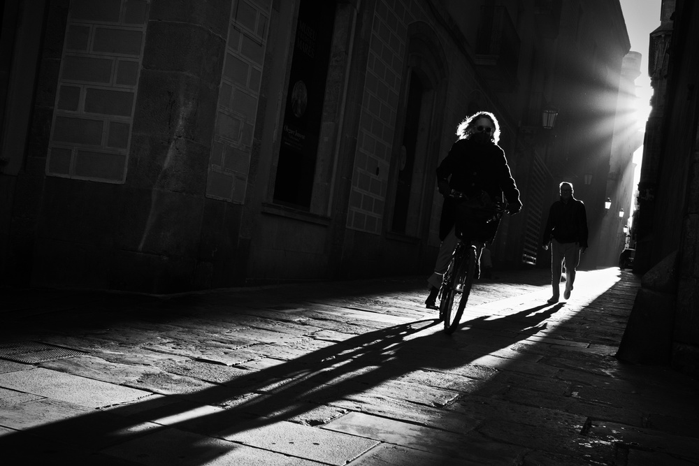 Sunlit City Shadows by Ignasi Raventos — canvas wall art