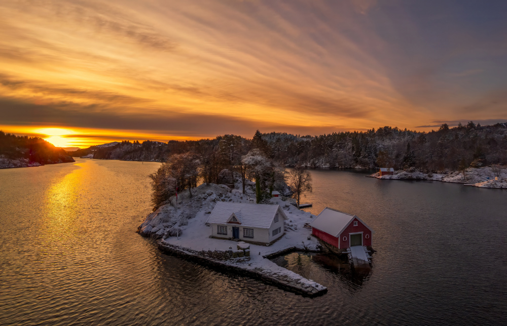 Snowy Island Sunset by Rune Askeland — canvas wall art