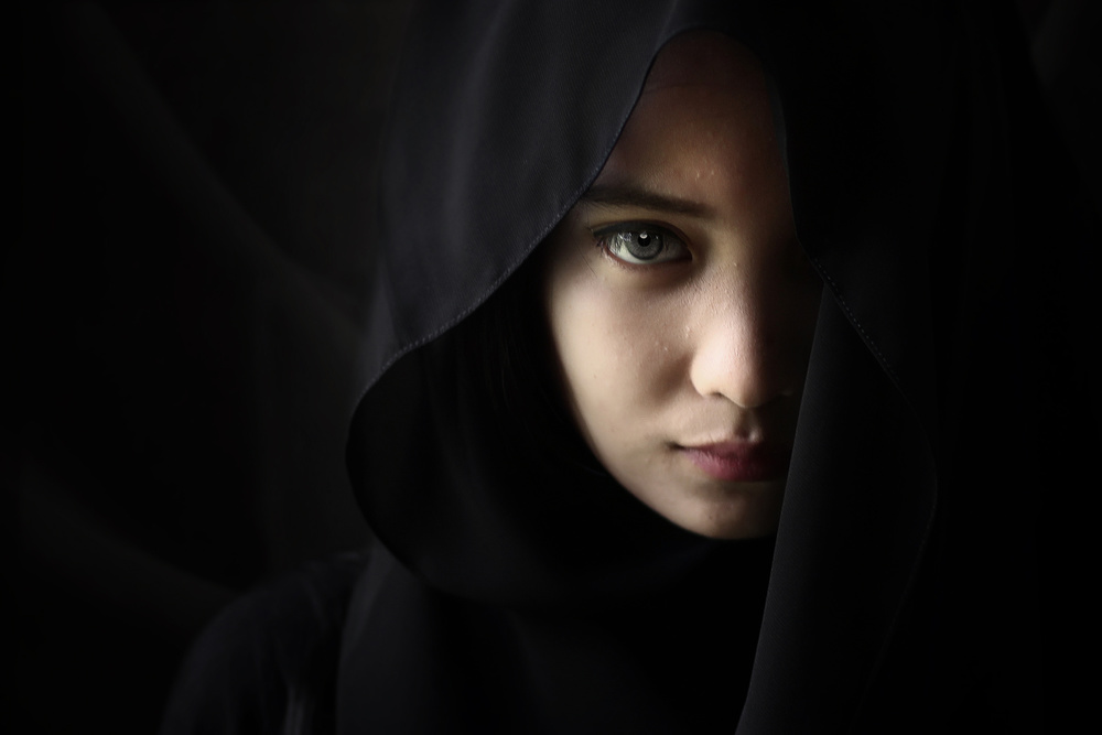 Mysterious Hooded Gaze by bonifasius wahyu adi f — canvas wall art