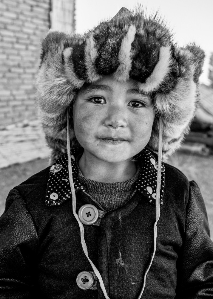 Smiling Child Fur Hat by ADIREK M — canvas wall art