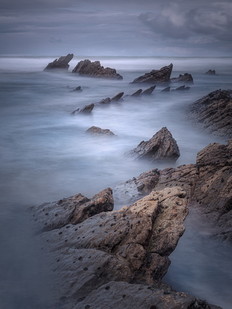 Misty Ocean Rocks by Clara Gamito — canvas wall art