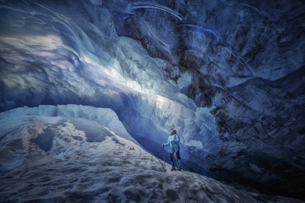 Blue Ice Cave Exploration by Clara Gamito — canvas wall art