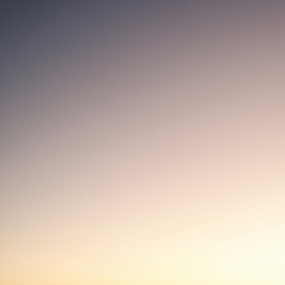 Sunset Over Distant Mountains