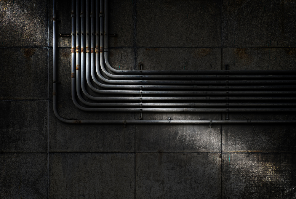 Dark Industrial Pipes by Wim Schuurmans — canvas wall art