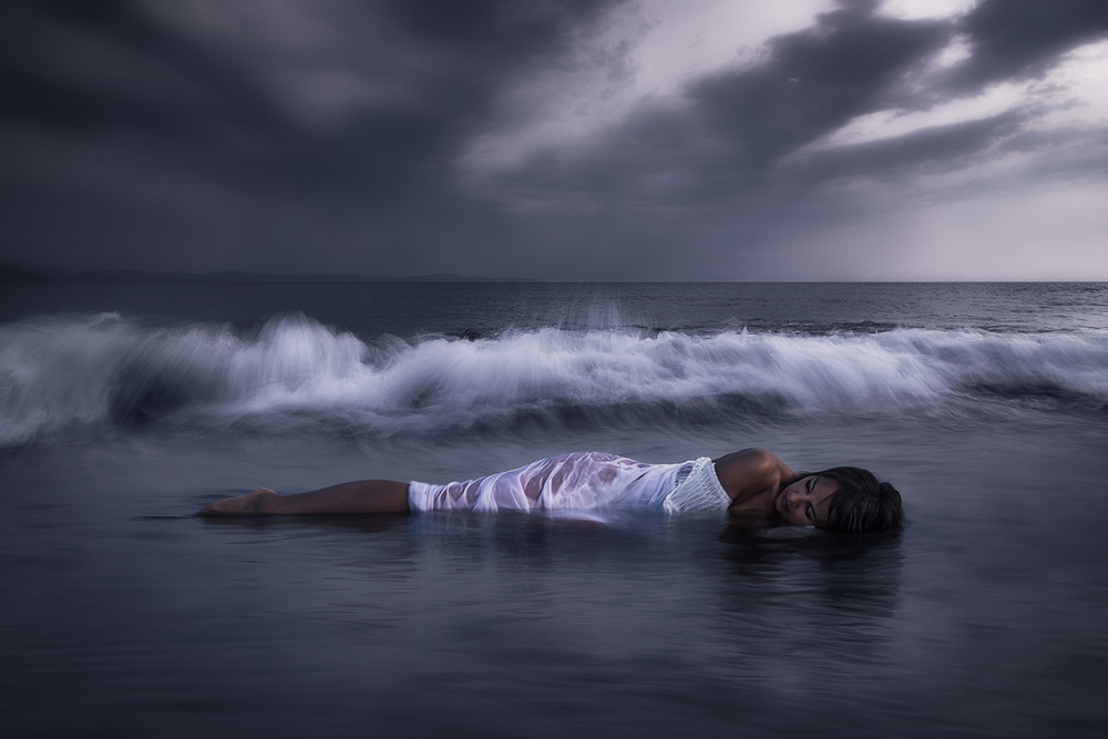 Sleeping Woman in Waves by Maria Kaimaki — canvas wall art