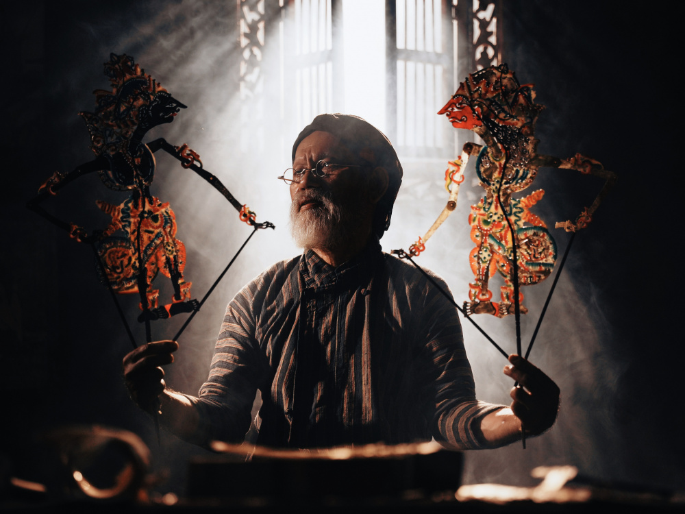 Traditional Shadow Puppeteer by Asep Awaludin — canvas wall art