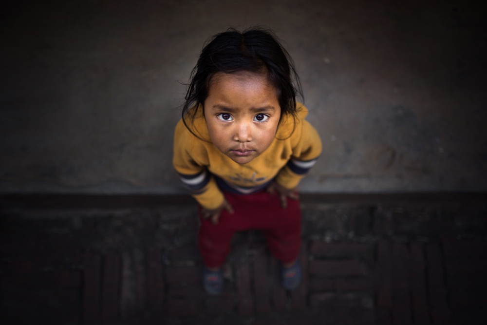 Child's Upward Gaze by Mohammed Baqer — canvas wall art