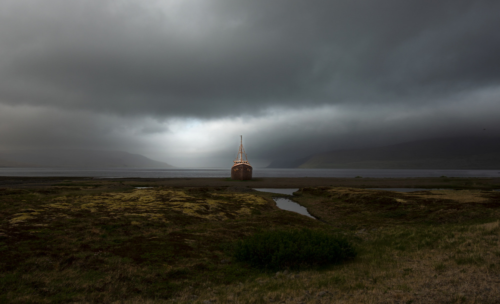 Abandoned Boat Under Light by Erik Engström — canvas wall art