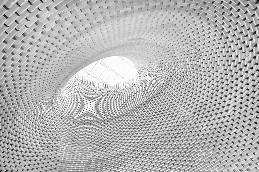 Swirling Brick Tunnel by Joshua Raif — canvas wall art