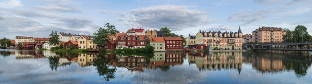Colorful City River Reflections by Arne Östlund — canvas wall art