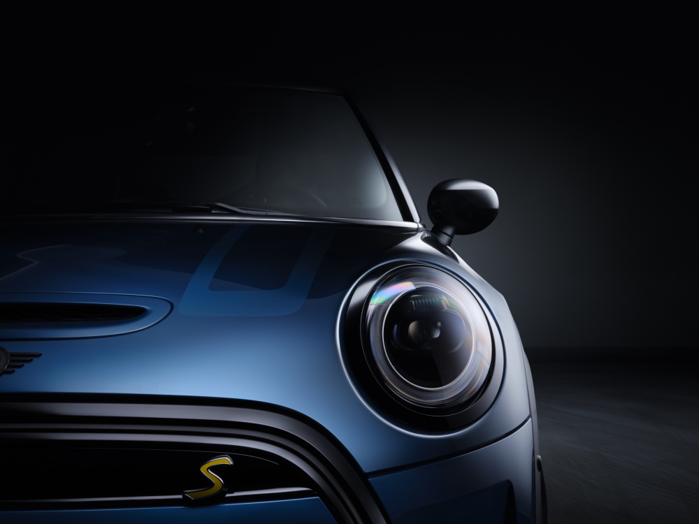Sleek Blue Electric Car by Rafal R. Nebelski — canvas wall art