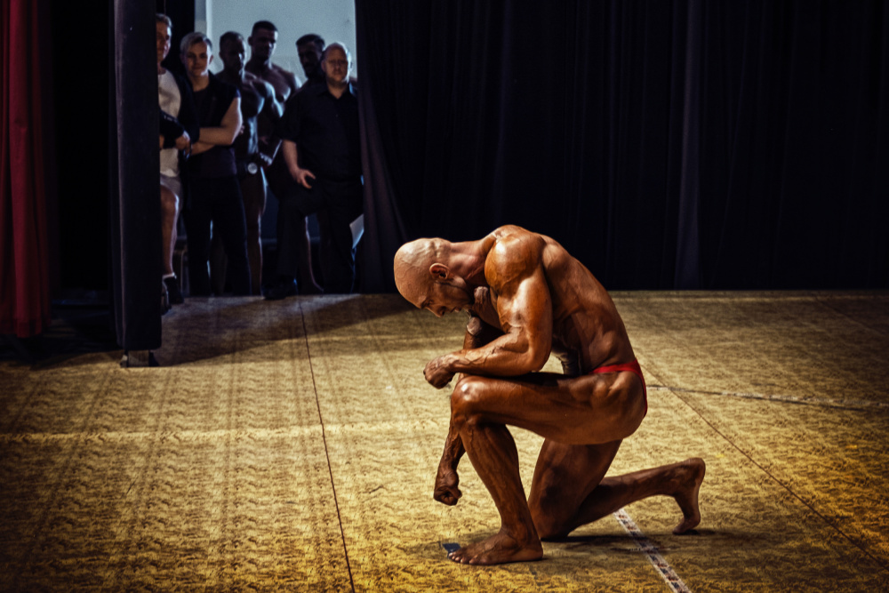 Bodybuilder's Stage Moment by Petr Kleiner — canvas wall art