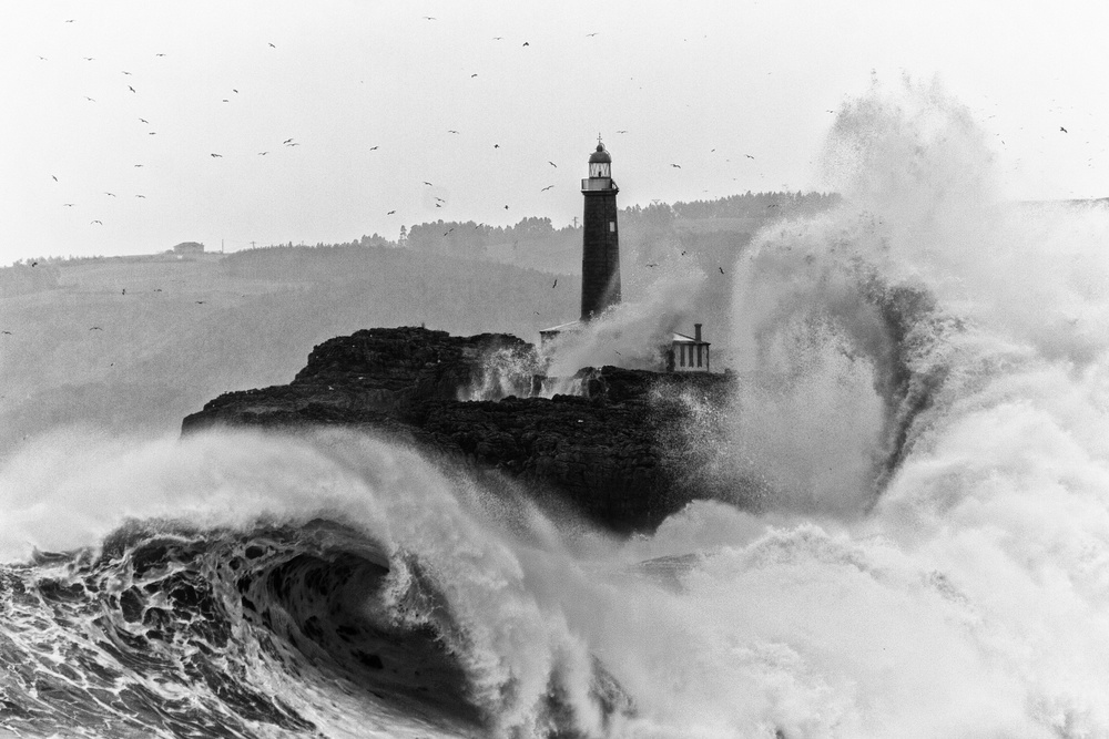 Stormy Lighthouse Waves by Jesus Concepcion Alvarado — canvas wall art