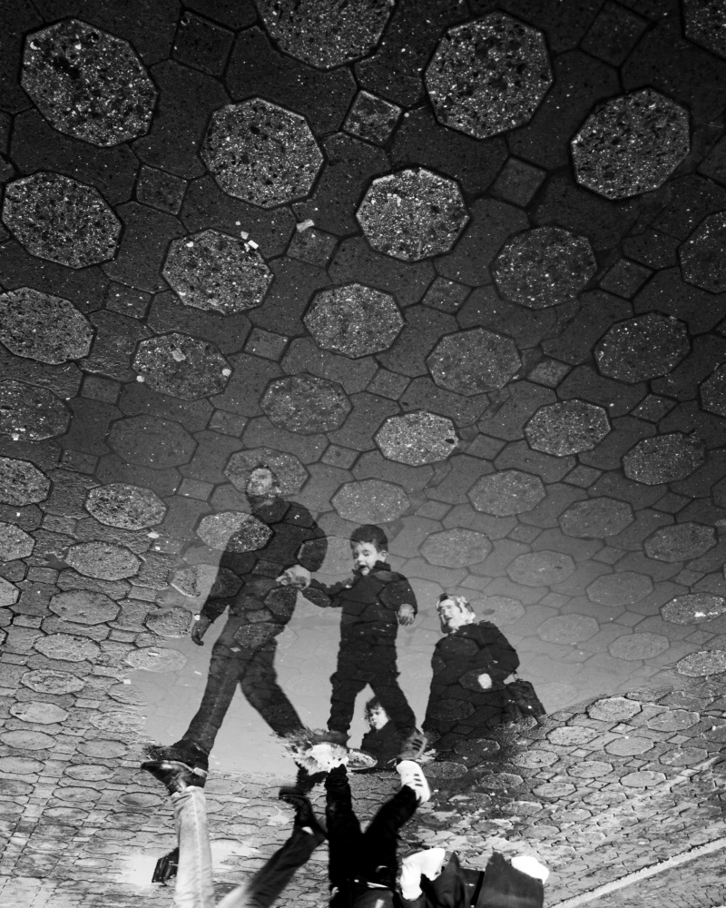 Family Puddle Reflection by Doruk Uysal — canvas wall art