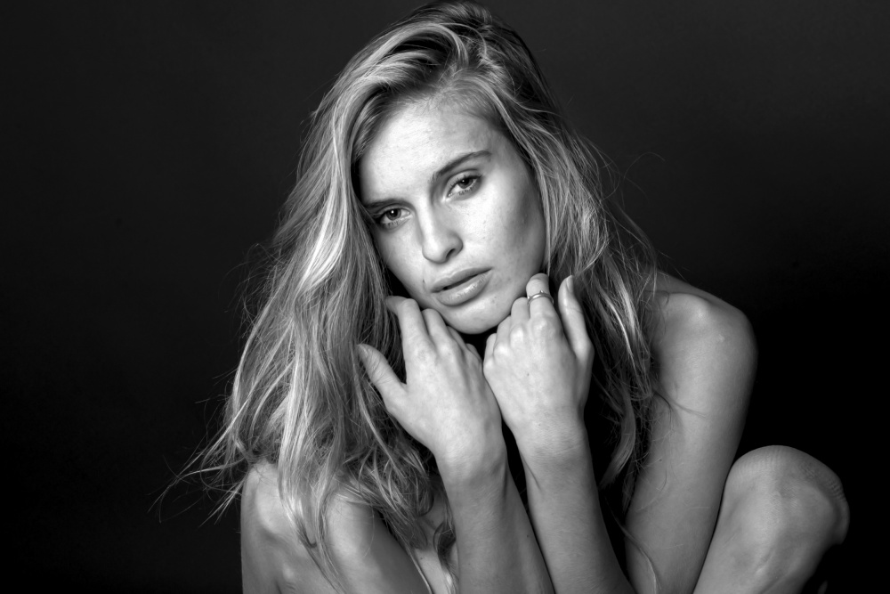 Elegant Pensive Woman by Shuki Laufer — canvas wall art
