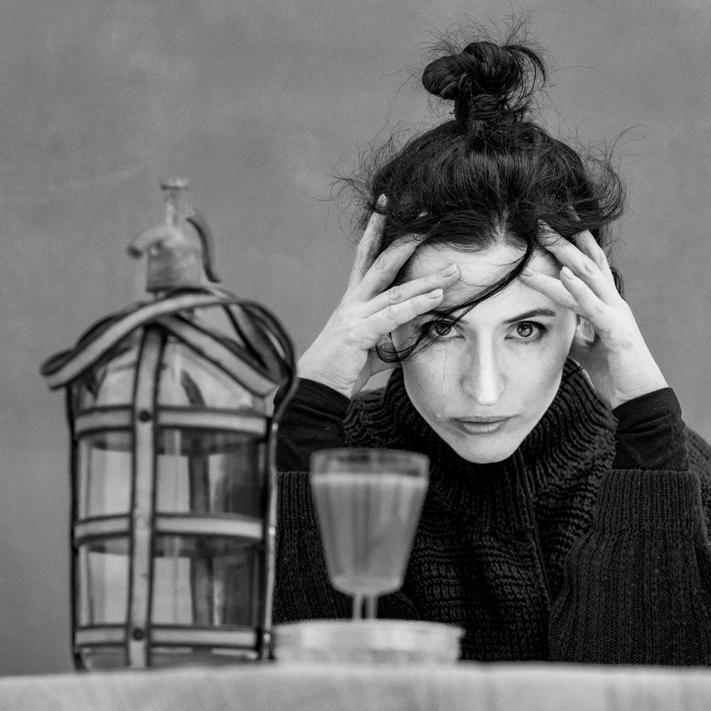Pensive Woman Black White by Silvija Danelsone — canvas wall art