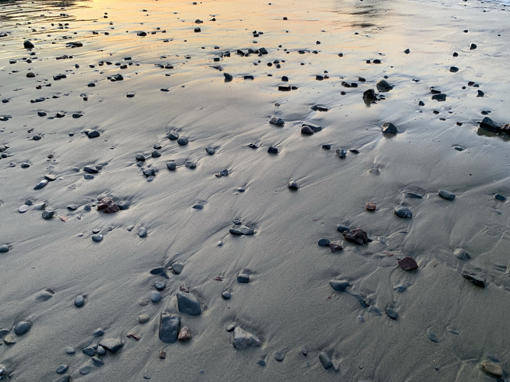 Golden Hour Beach Stones by GuruShots — canvas wall art