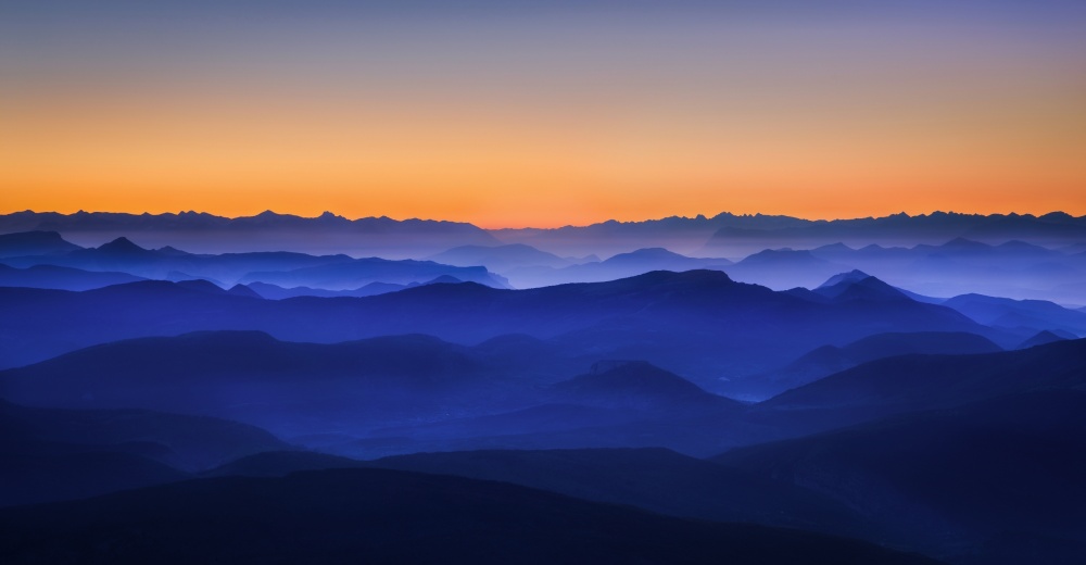 Orange Sky Mountain Layers by David Bouscarle — canvas wall art
