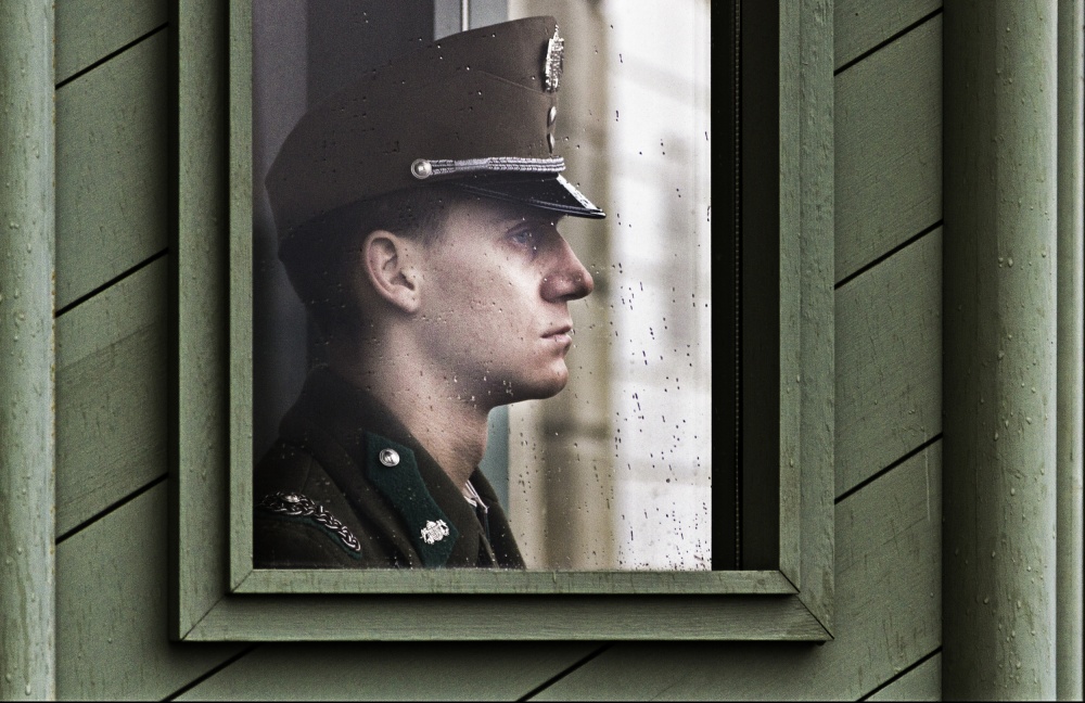 Pensive Soldier in Rain by Danna Sladjana — canvas wall art
