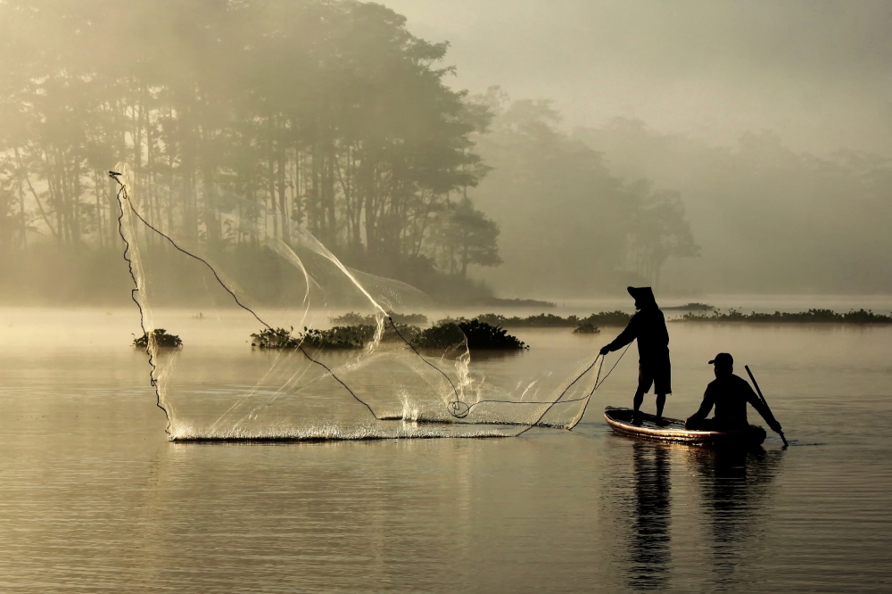 Misty Morning Fishing by Angela Muliani Hartojo — canvas wall art