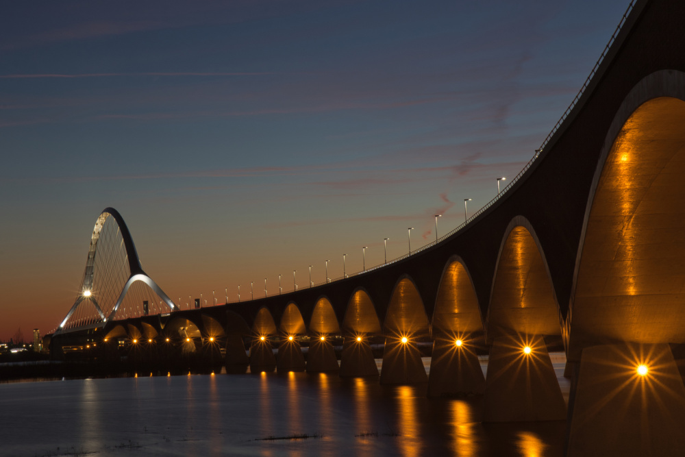 Twilight Bridge Glow by Anne Ponsen — canvas wall art