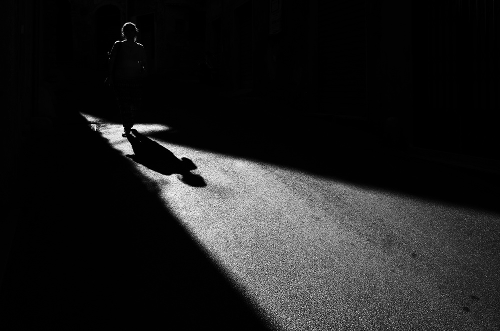 Walking Shadow Silhouette by Riccardo Lucidi — canvas wall art