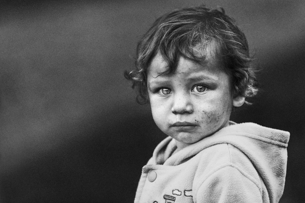 Thoughtful Child Gaze by Tunc Tuncel — canvas wall art