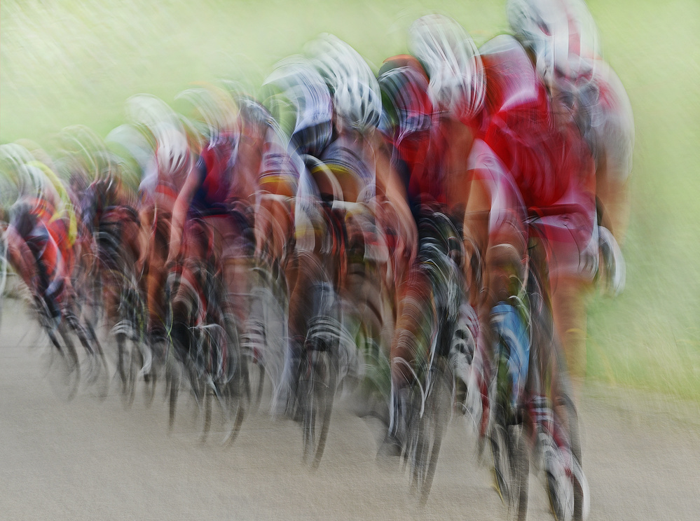 Racing Cyclists Blur by Lou Urlings — canvas wall art