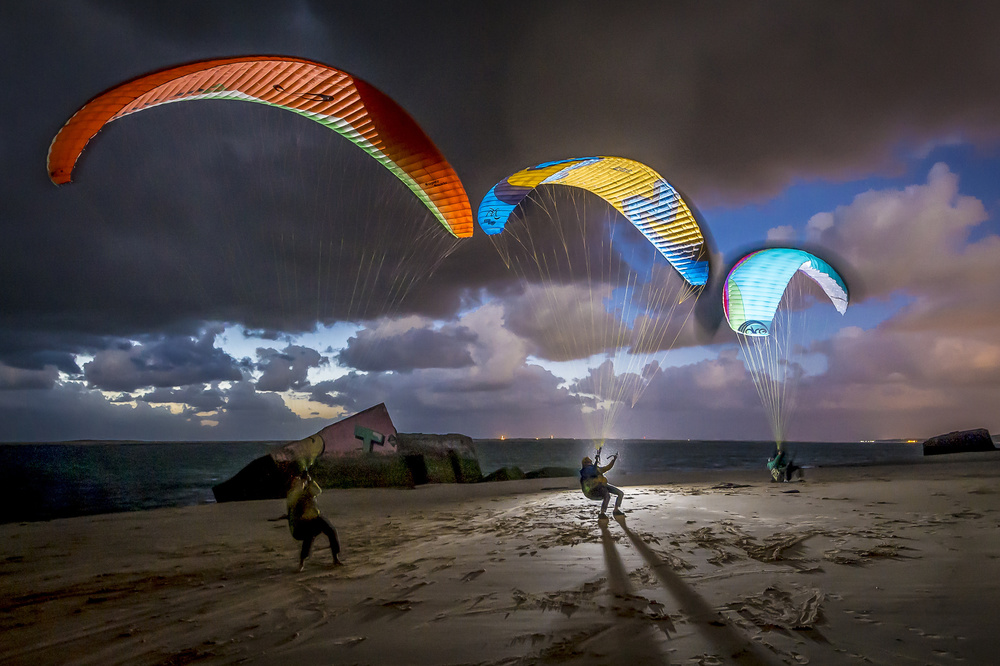 Paragliding Night Glow by Tristan Shu — canvas wall art