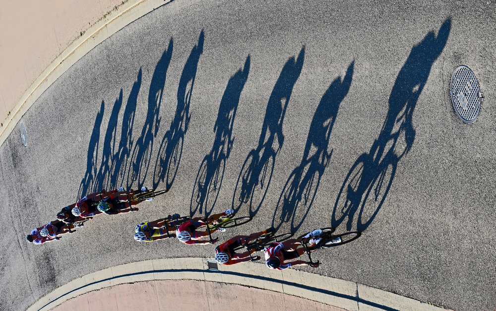 Sunny Cycling Shadows by Lou Urlings — canvas wall art