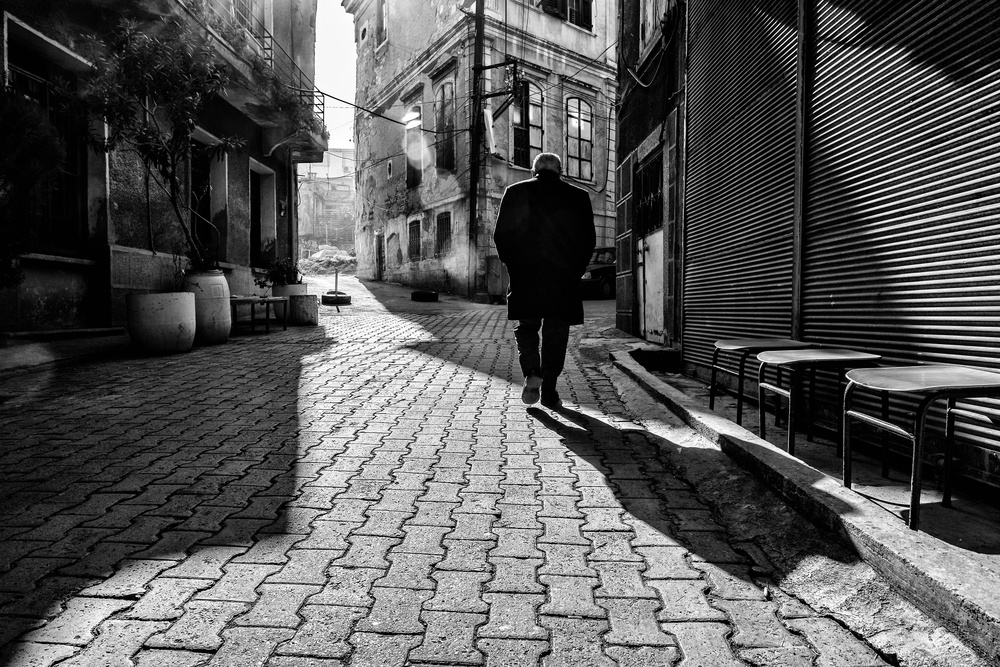 Dramatic Street Shadow Man by Yasemin Bakan — canvas wall art